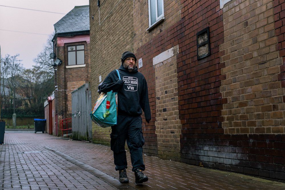 Homeless man walking the streets