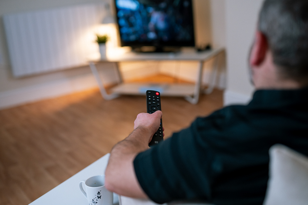 Man off the streets - watching tv